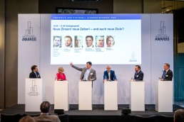 00009_Awards23_Jako_Strategiepanel_Neue_Zinsen_1000_1100